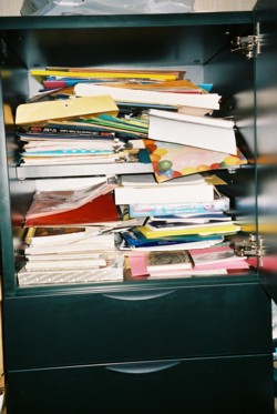disorganized stationery cupboard