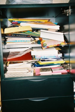 disorganized stationery cupboard